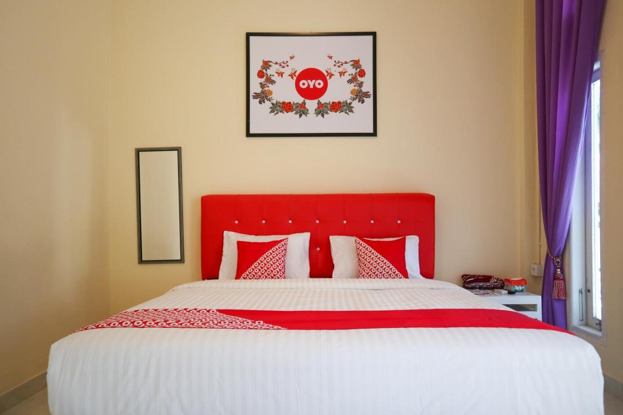 Oyo 2202 Delima Guest House Syariah Padang Kültér fotó